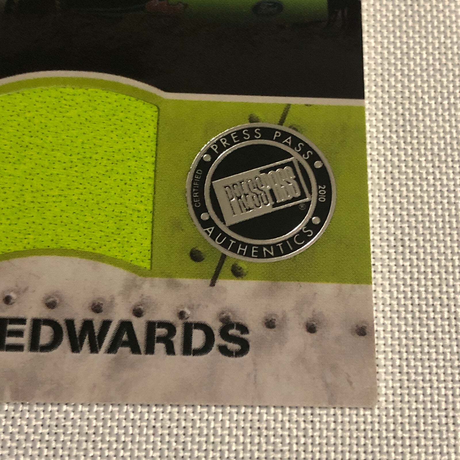 2010 Press Pass Carl Edwards Battle Armor Race Used Sheet Metal Relic Card /225