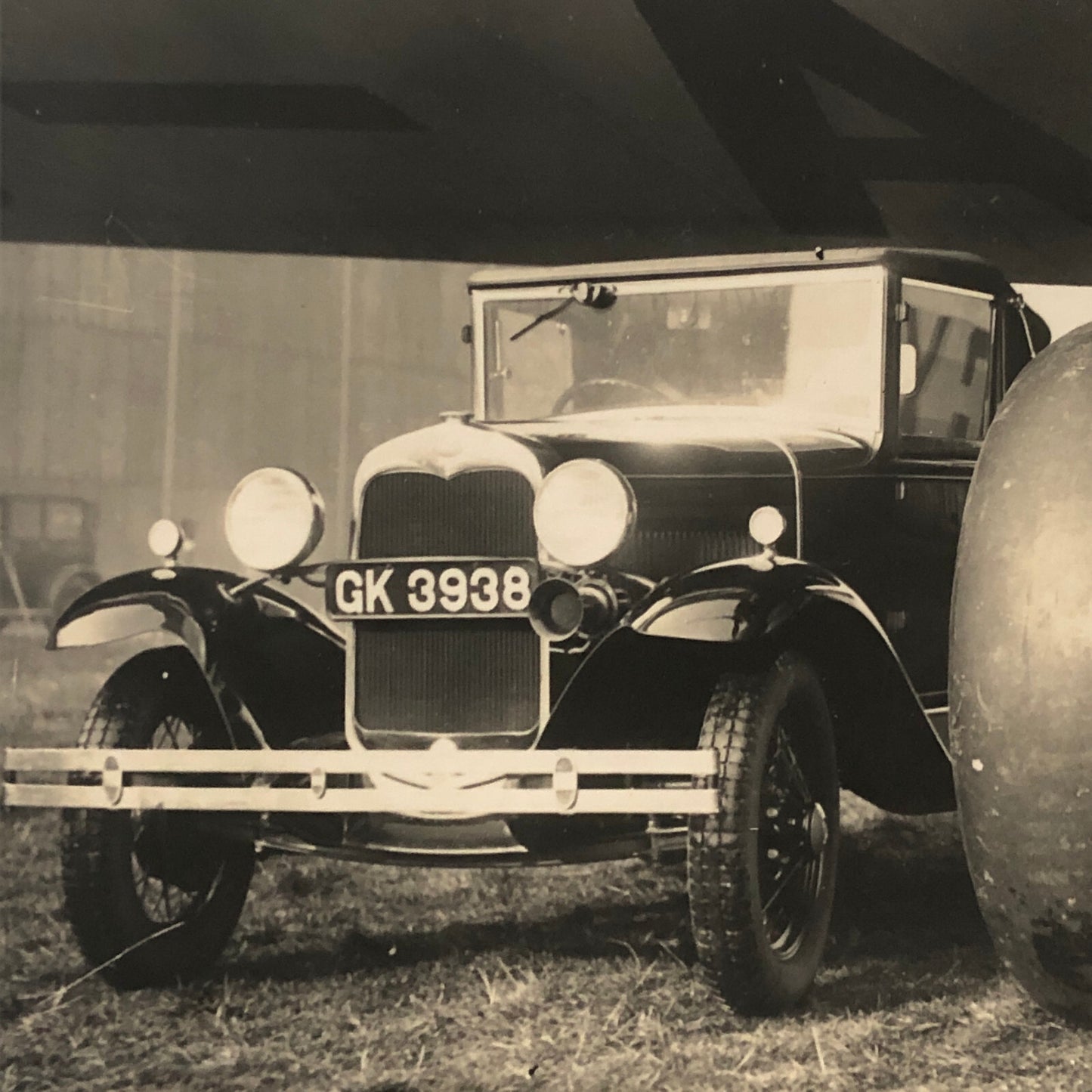 Hannibal Aircraft Landing Wheel with Ford Car Press Photo Photograph Airplane