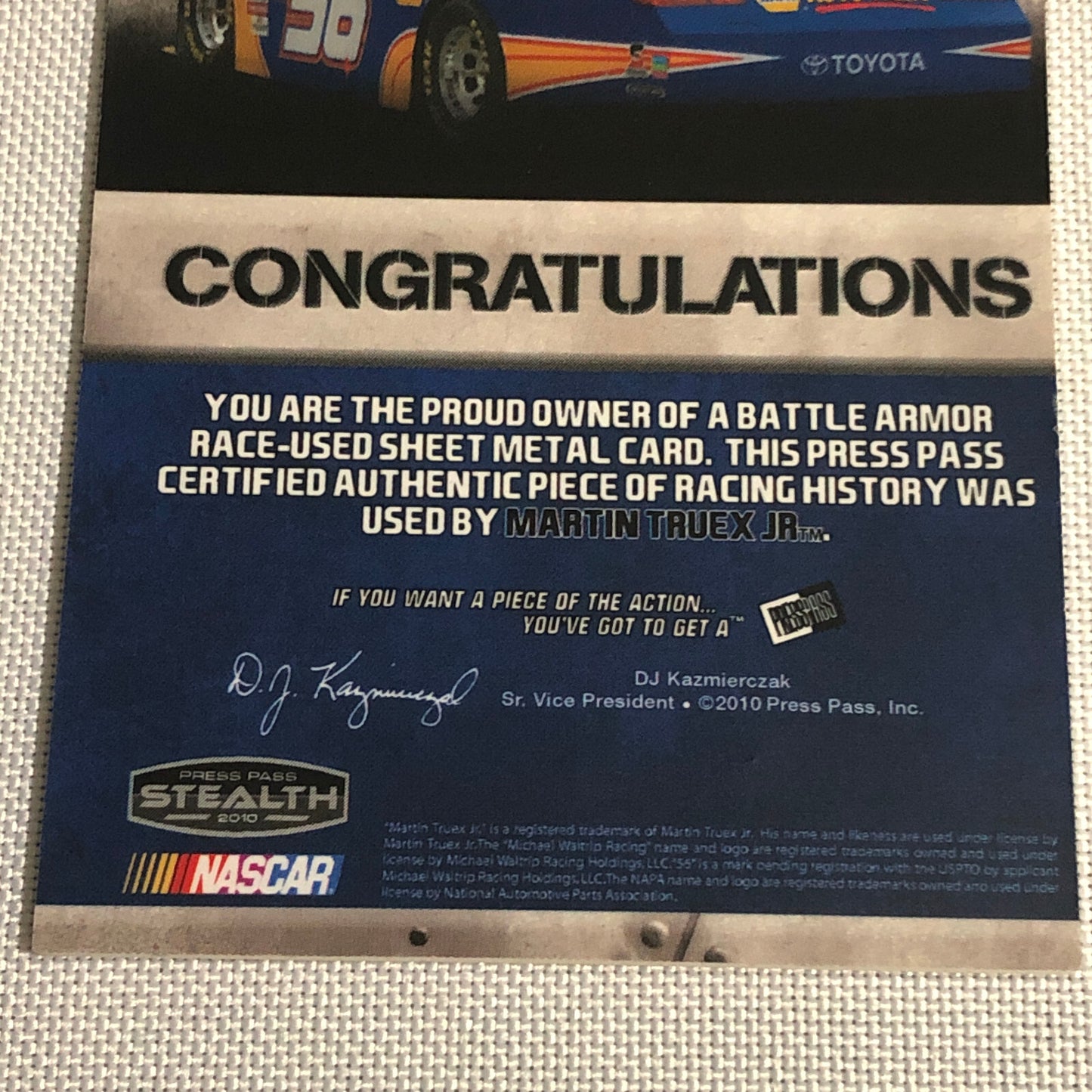 2010 Press Pass Martin Truex Jr Battle Armor Race Sheet Metal Relic Card /225