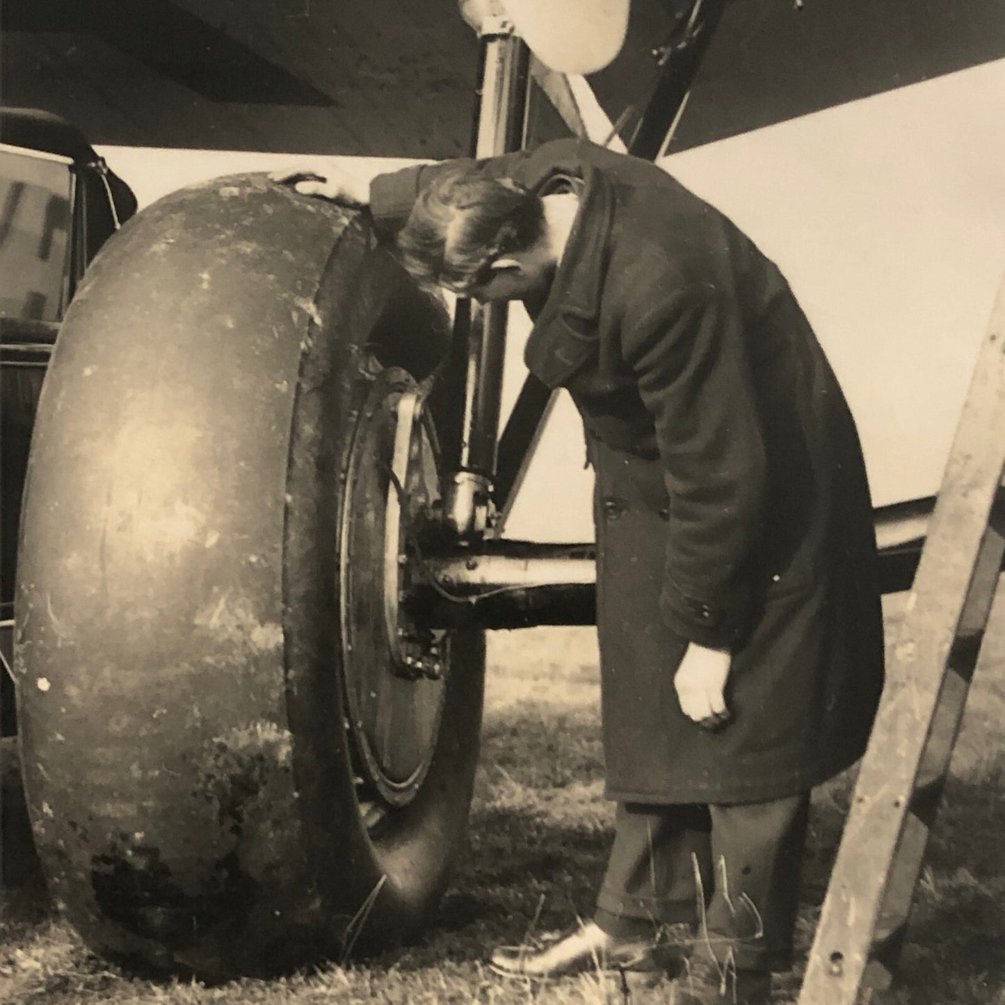 Hannibal Aircraft Landing Wheel with Ford Car Press Photo Photograph Airplane