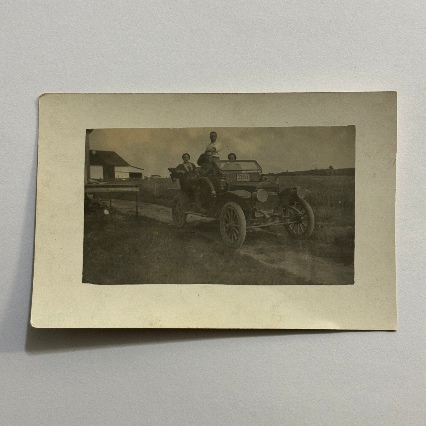 Real Photo Postcard RPPC People and Antique Car Automobile Vintage License Plate