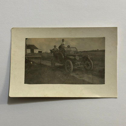 Real Photo Postcard RPPC People and Antique Car Automobile Vintage License Plate
