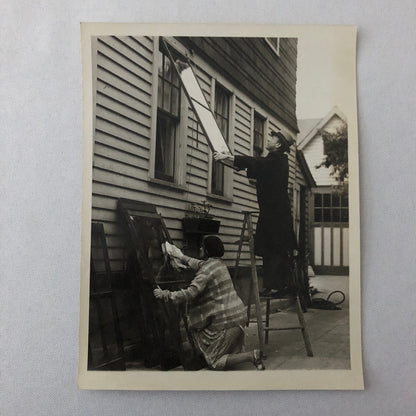 Press Photo Photograph Couple Putting Up Storm Windows Winter Keystone Underwood