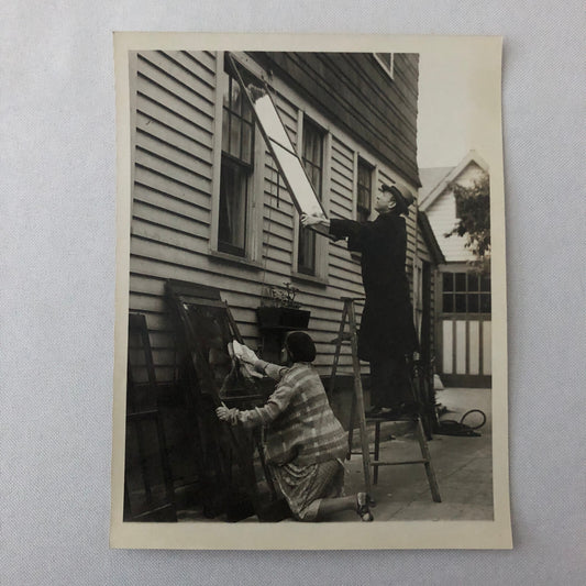 Press Photo Photograph Couple Putting Up Storm Windows Winter Keystone Underwood