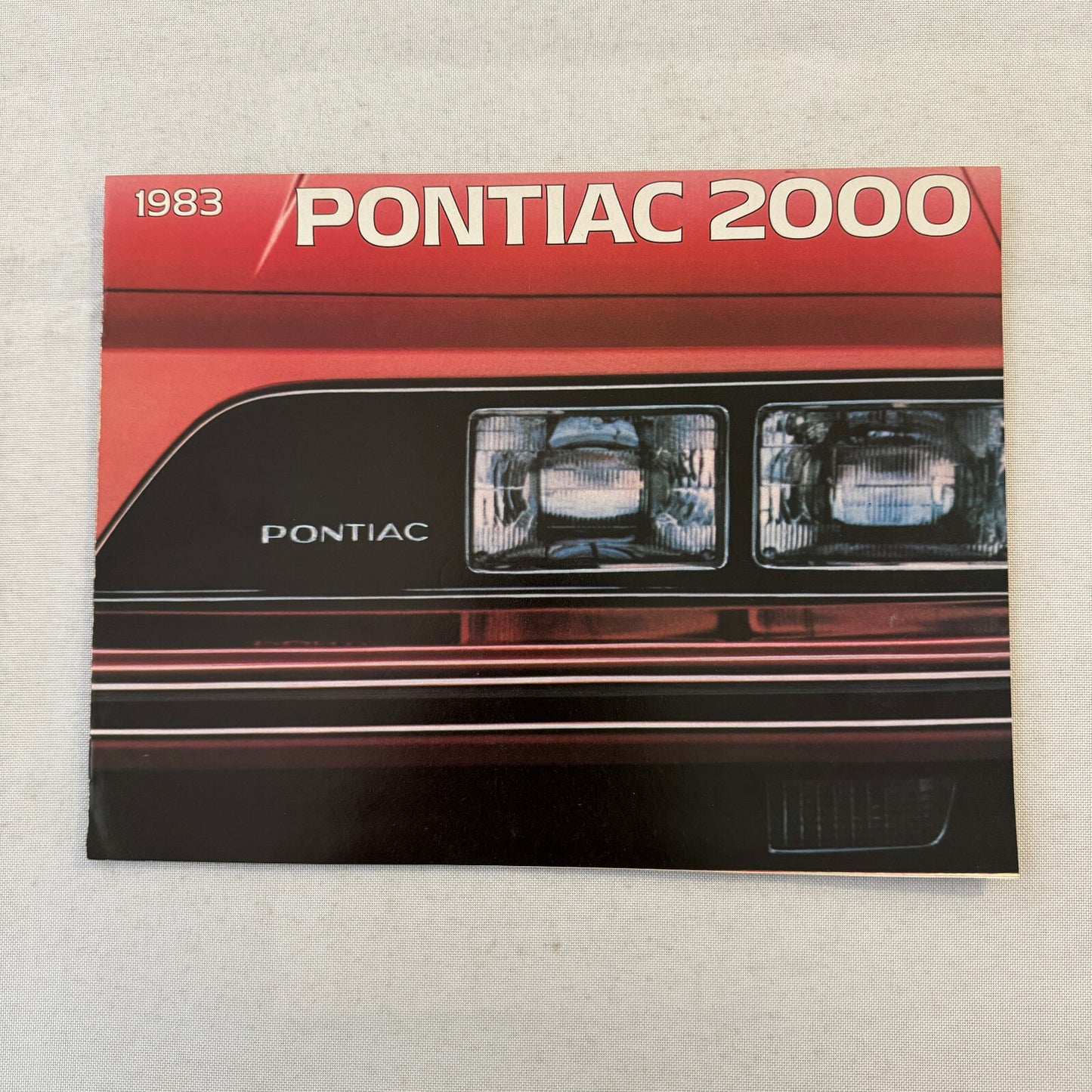 1983 Pontiac 2000 Car Sales Brochure Catalog Convertible Coupe Sedan Hatch Wagon