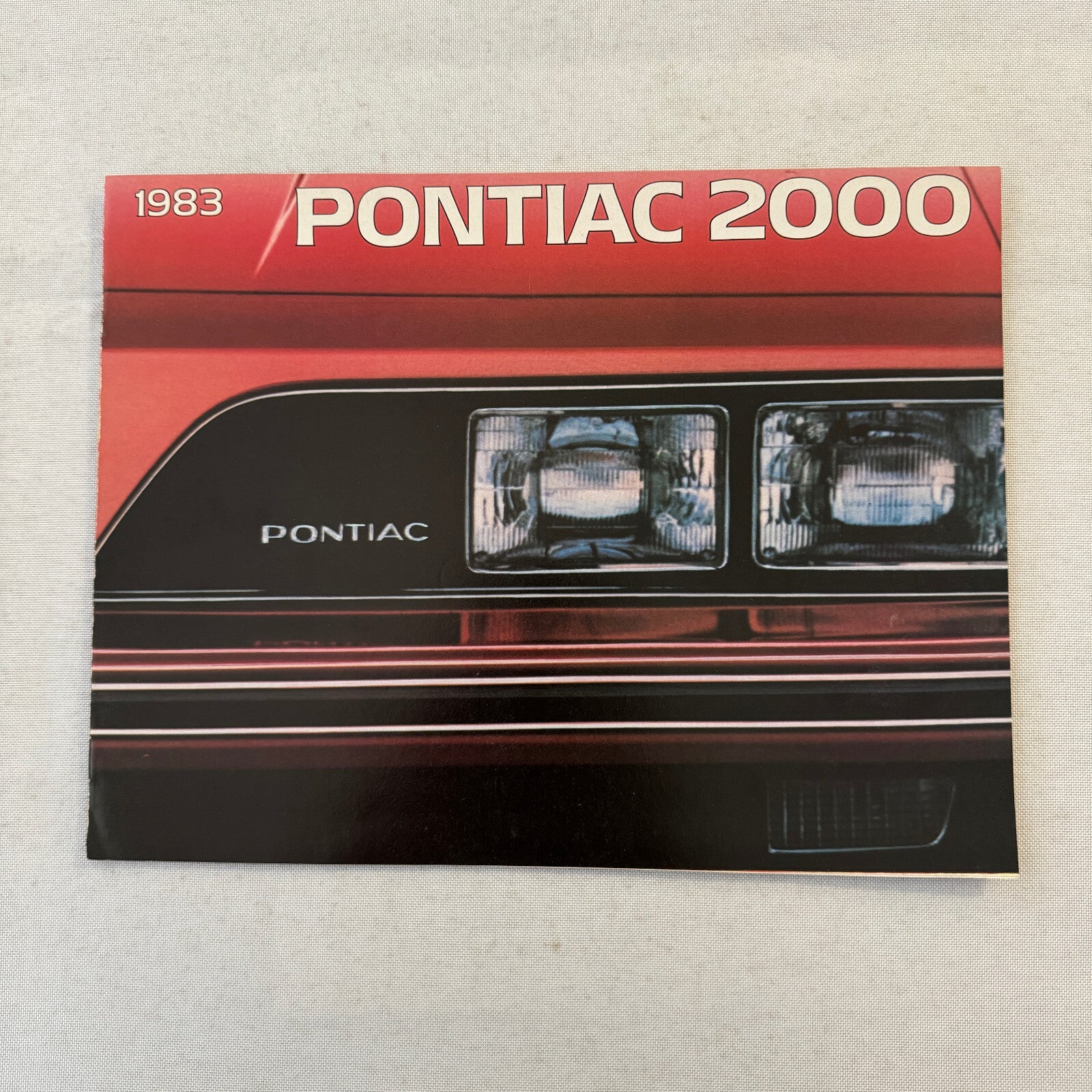 1983 Pontiac 2000 Car Sales Brochure Catalog Convertible Coupe Sedan Hatch Wagon