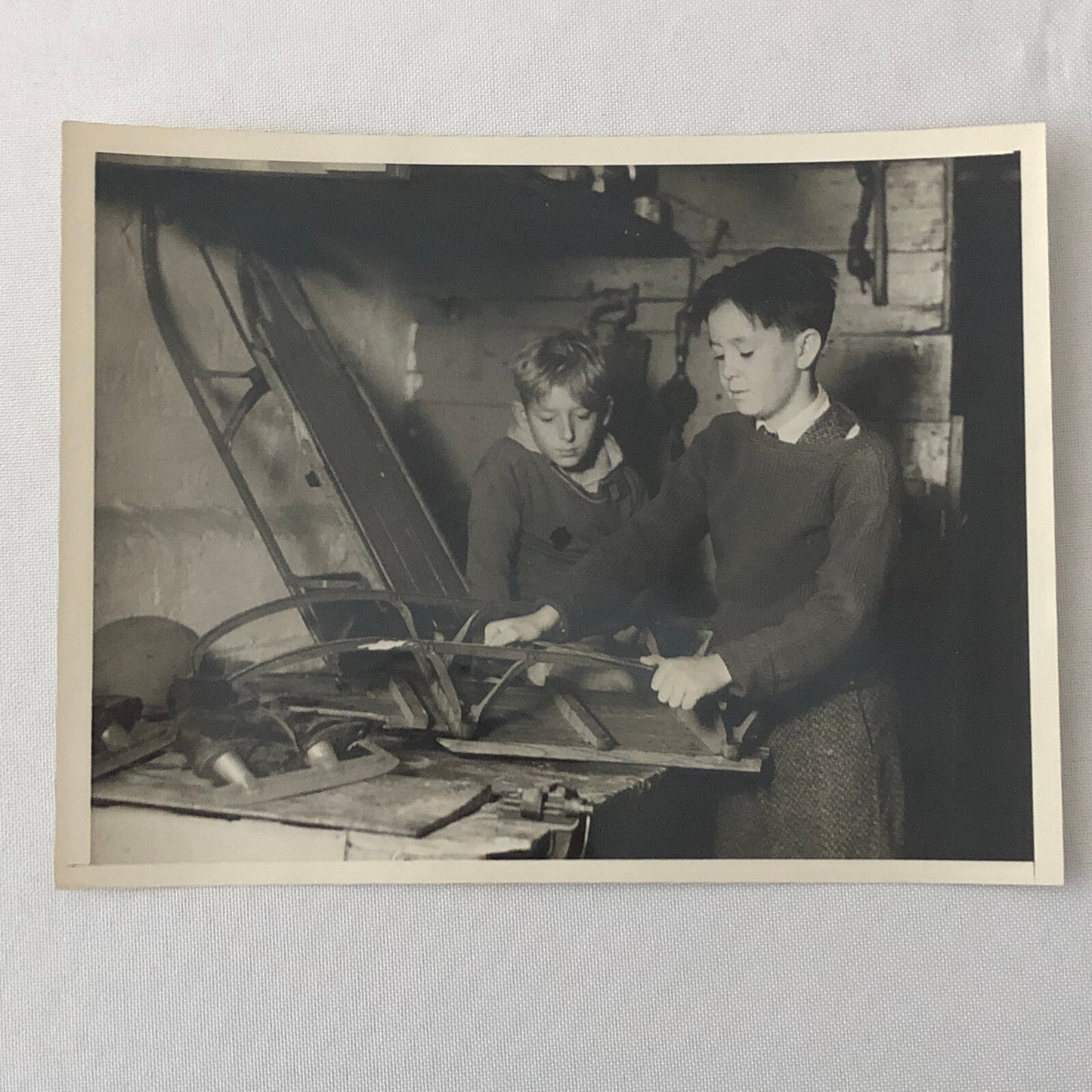 Press Photo Photograph Kids Sharpening Skates and Sled Keystone Underwood Photo