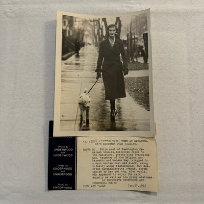 1933 Press Photo Photograph Daughter of Belgian Ambassador Walking Dog in Rain