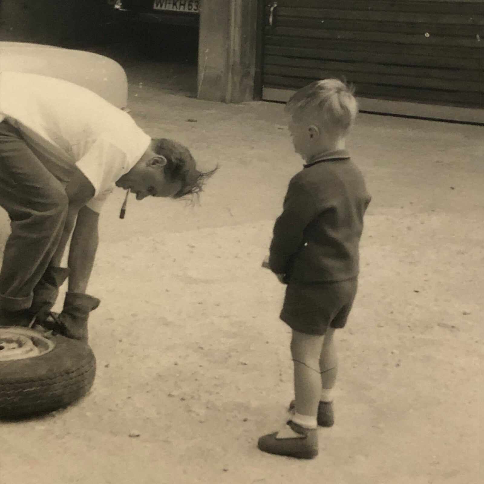 Vintage Photo Photograph Man Changing Car Tire with Child Cermany