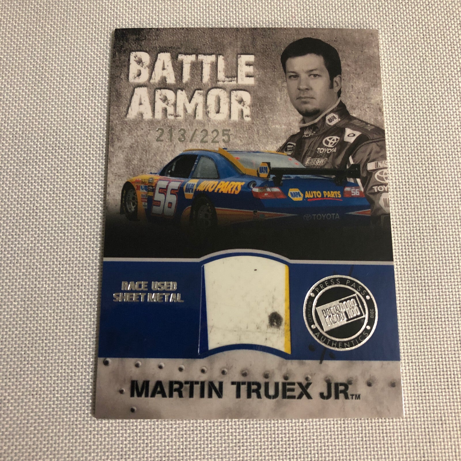 2010 Press Pass Martin Truex Jr Battle Armor Race Sheet Metal Relic Card /225