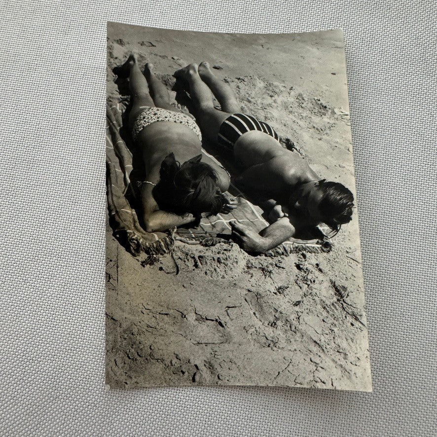Vintage Photograph Sunbathing Couple On Beach Racing Driver Graham Hill ?