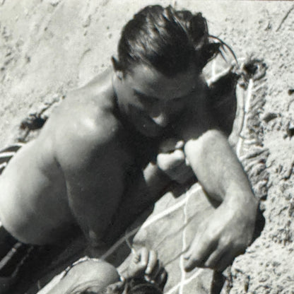 Vintage Photograph Sunbathing Couple On Beach Racing Driver Graham Hill ?