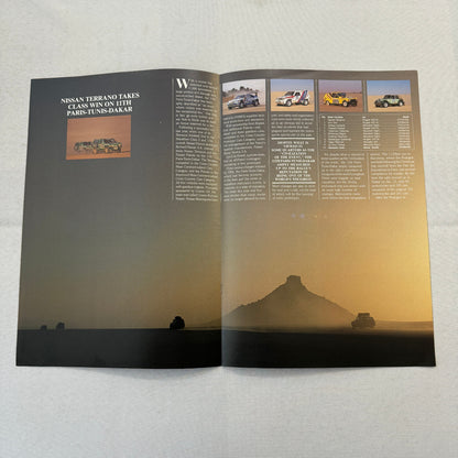 1989 Nissan Motorsports Factory Magazine Brochure Paris Dakar Rally Rallye