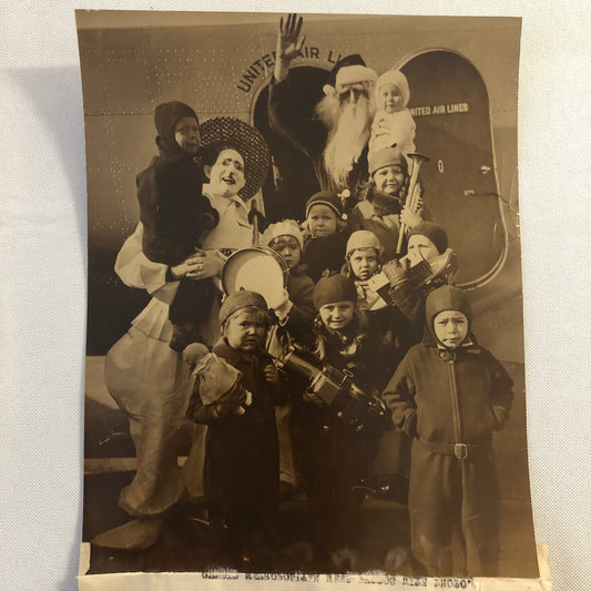Press Photo Photograph Santa Claus By Plane at Mandel Bros Department Store