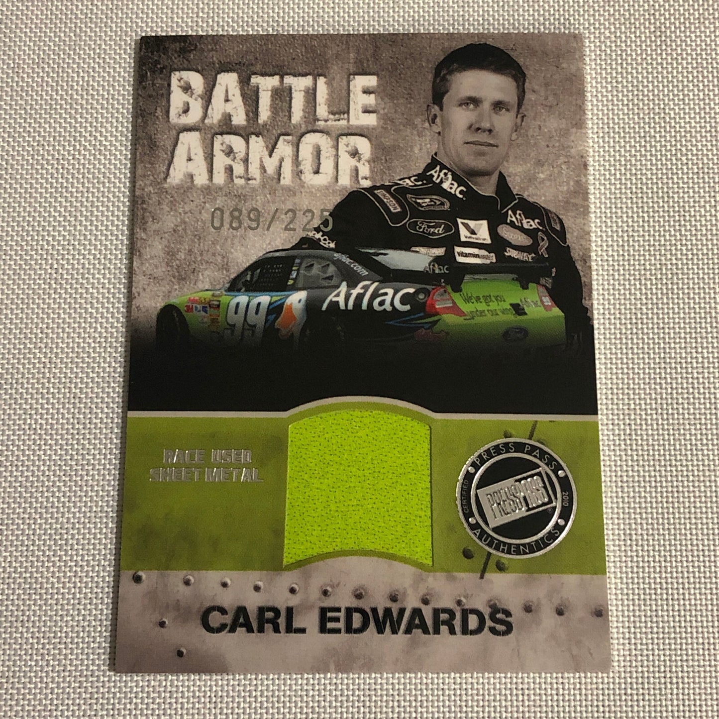 2010 Press Pass Carl Edwards Battle Armor Race Used Sheet Metal Relic Card /225