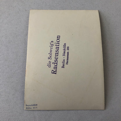 Circus Clown Performer on Bicycle Bike Photograph Photo Berlin Germany