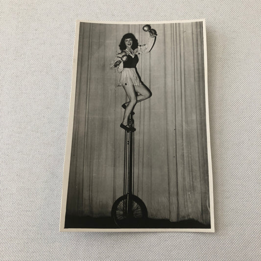Circus Performer Balancing Act on Unicycle Photo Photograph Berlin Germany