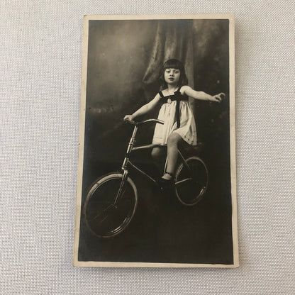 Circus Performer Girl Child on Bicycle Real Photo Postcard Post Card RPPC