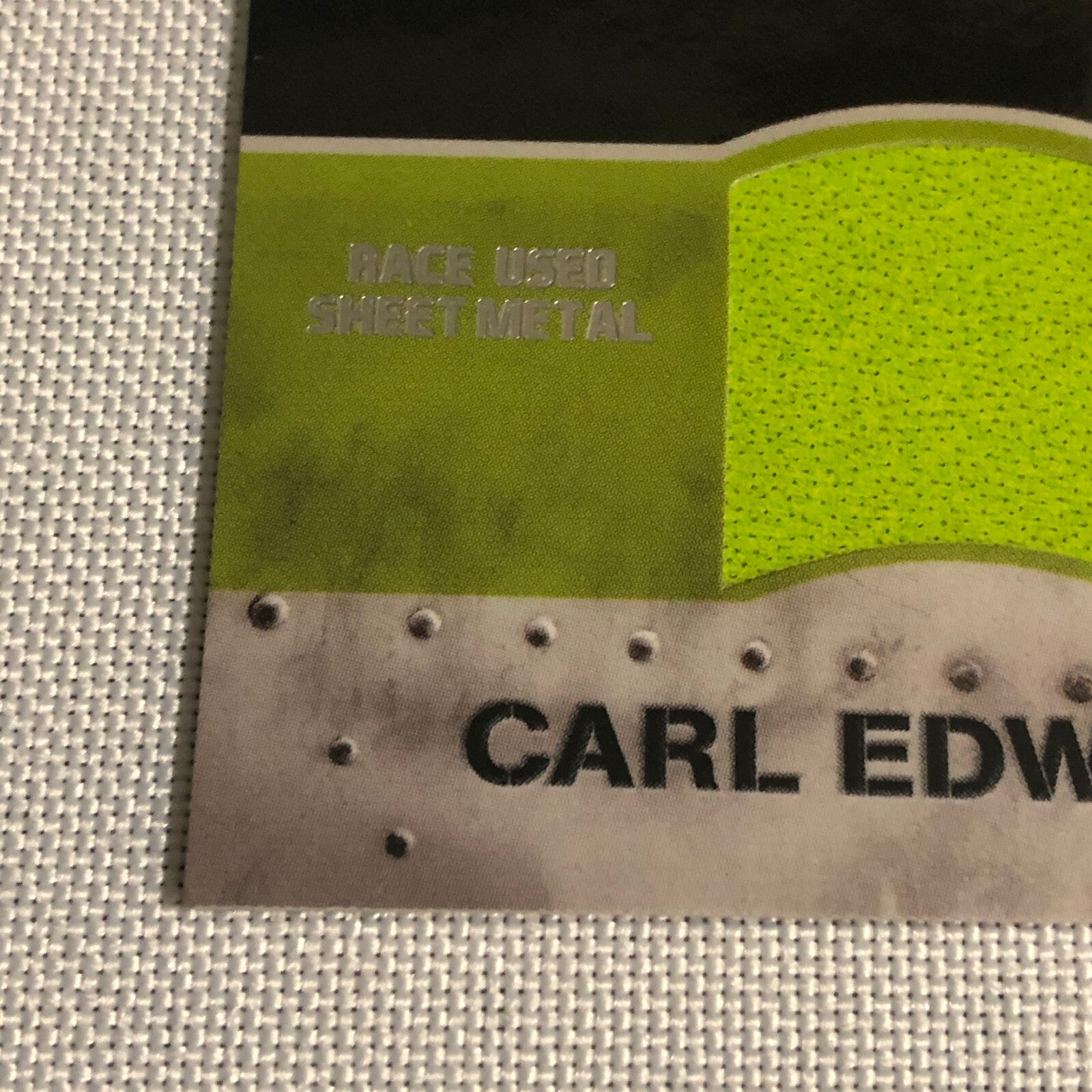 2010 Press Pass Carl Edwards Battle Armor Race Used Sheet Metal Relic Card /225